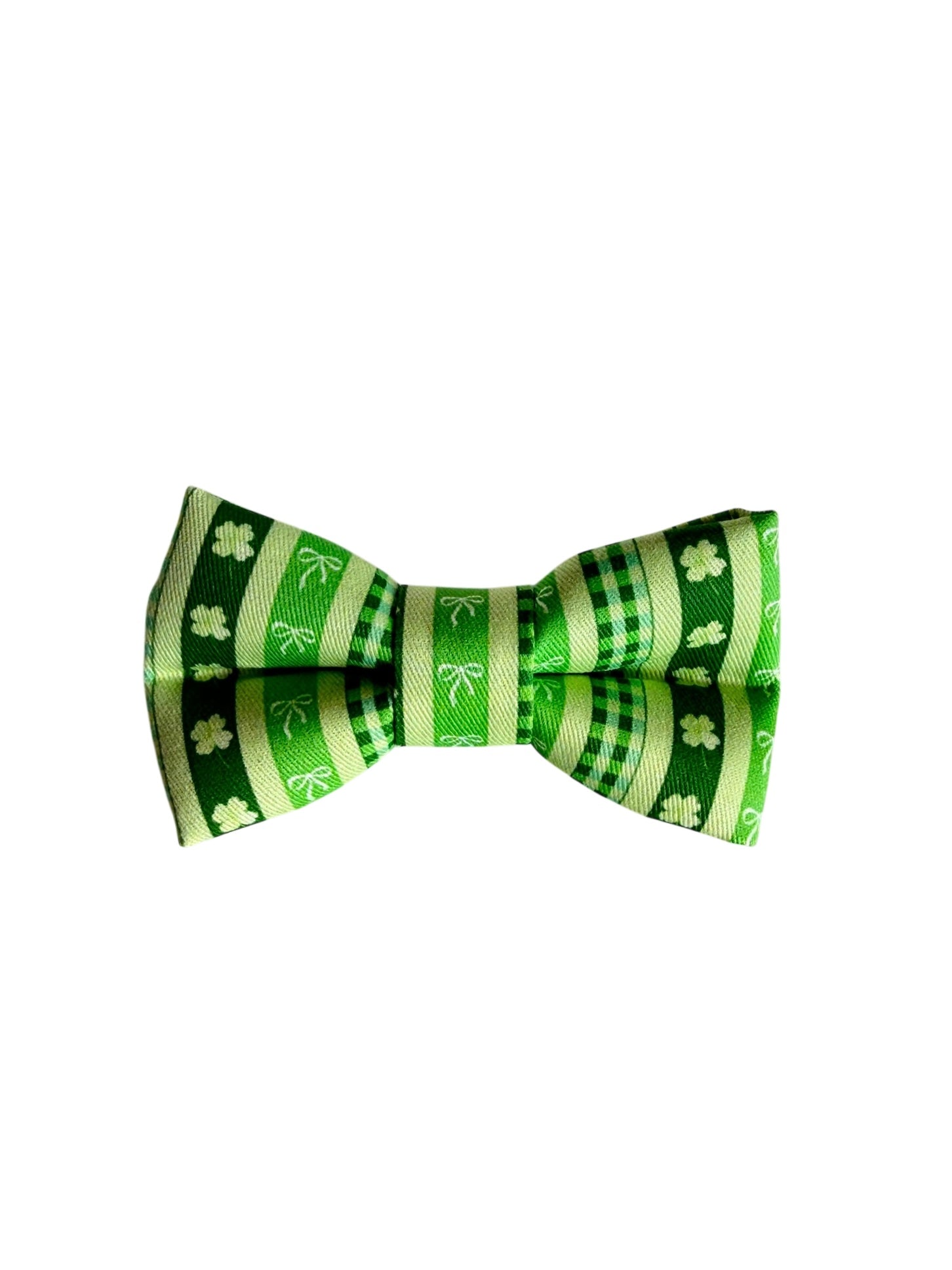 Green bow tie with shamrock, bow, and plaid pattern on a white background. Adjustable with velcro. Custom dog bow tie by Duke & Fox.