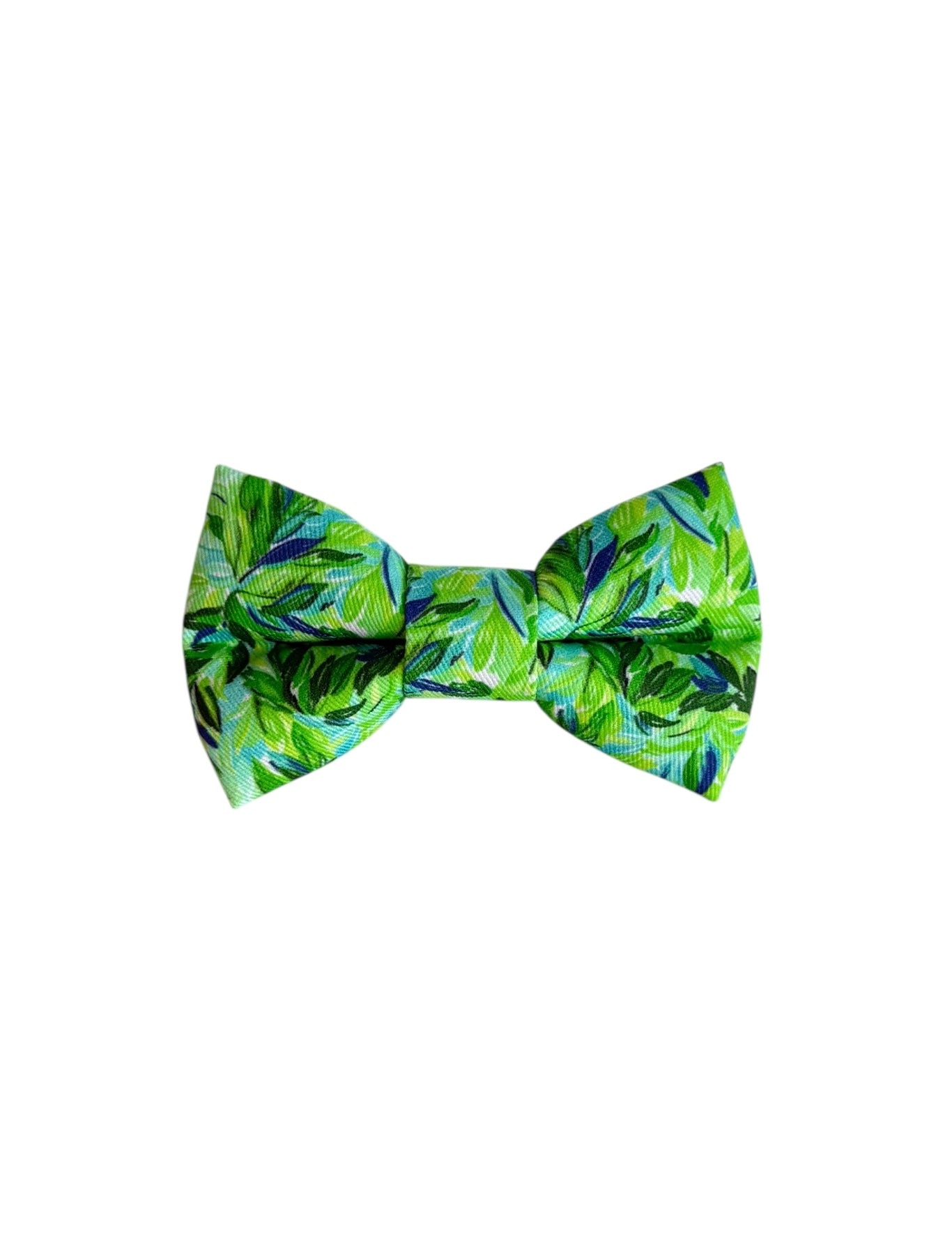 Green leaf-patterned bow tie on a white background. Adjustable with velcro. Custom dog bow tie by Duke & Fox.