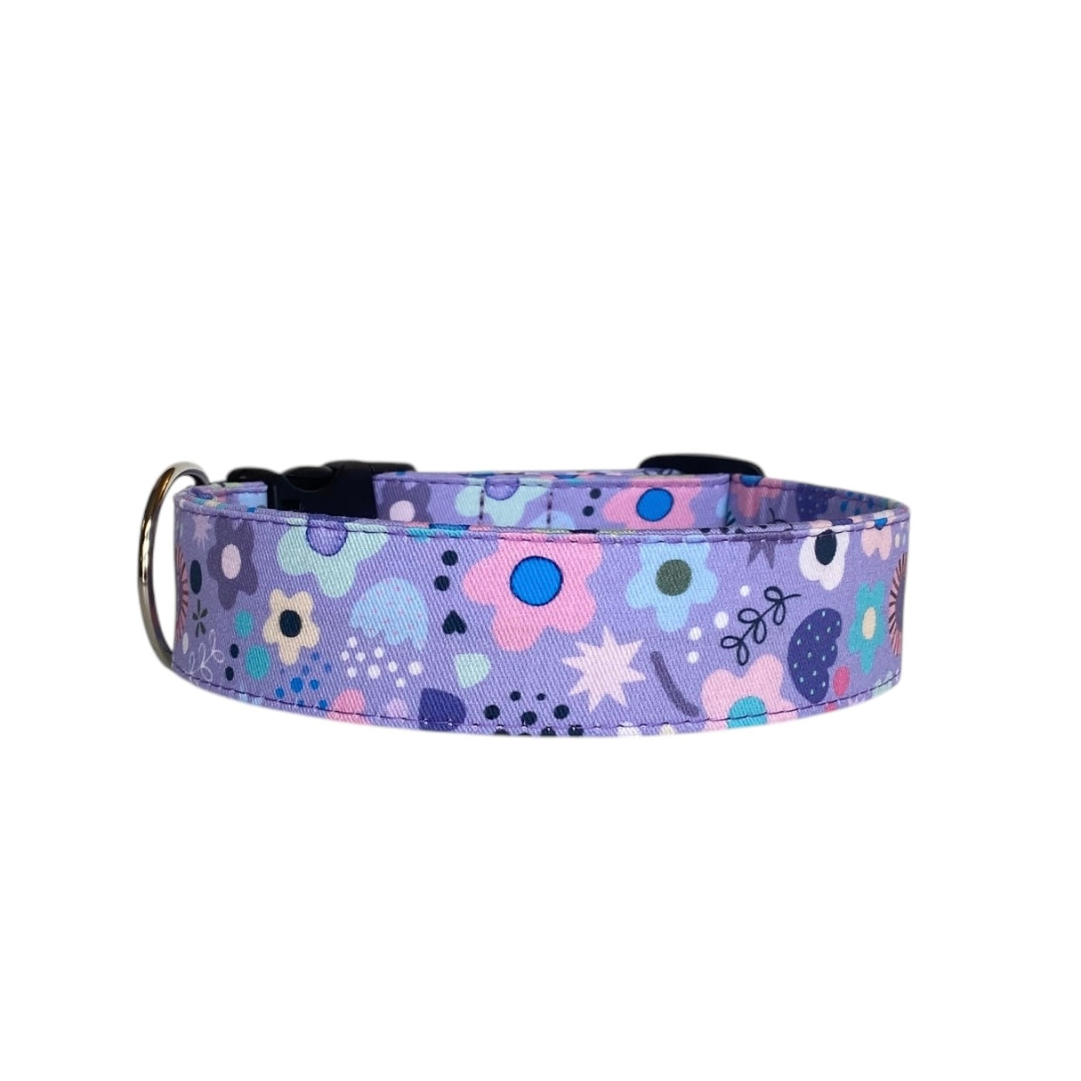This charming dog collar features a whimsical purple background adorned with a delightful array of pastel floral and abstract patterns. The soft, dreamy colors make it a perfect accessory for stylish pups who love to stand out.
For a personal touch, the collar can be customized with embroidered text, such as your dog's name, and the buckle can be engraved with important details, combining style and functionality. It's a unique and practical choice for your furry companion!