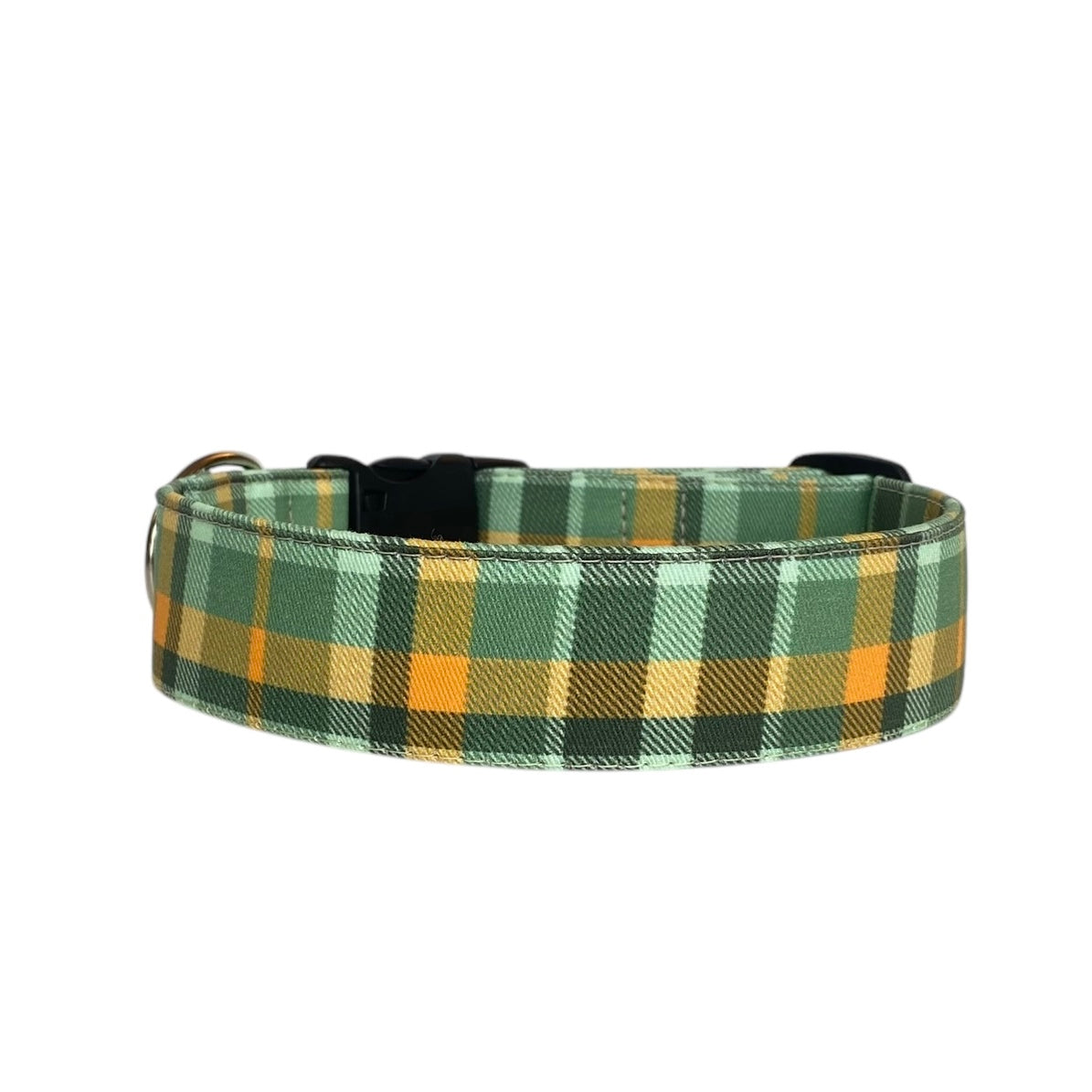 This is a festive and stylish St. Patrick's Day-inspired dog collar featuring a classic plaid pattern in shades of green, yellow, and gold, perfect for celebrating Irish traditions. It comes in a variety of sizes to fit dogs of all breeds and sizes, from small to large.
The collar is designed for customization, with the option to embroider your pet's name or a personalized message onto the fabric. Additionally, the buckle can be engraved with essential details, such as your pet's name or your contact infor