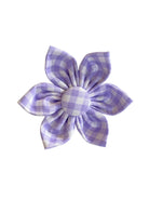 This adorable dog collar flower features a soft lavender gingham pattern, making it a perfect accessory for spring or any special occasion. The flower attaches easily and securely to any collar with a Velcro strap, ensuring a snug and stylish fit. Add a touch of charm and elegance to your pup’s look with this delightful accessory!