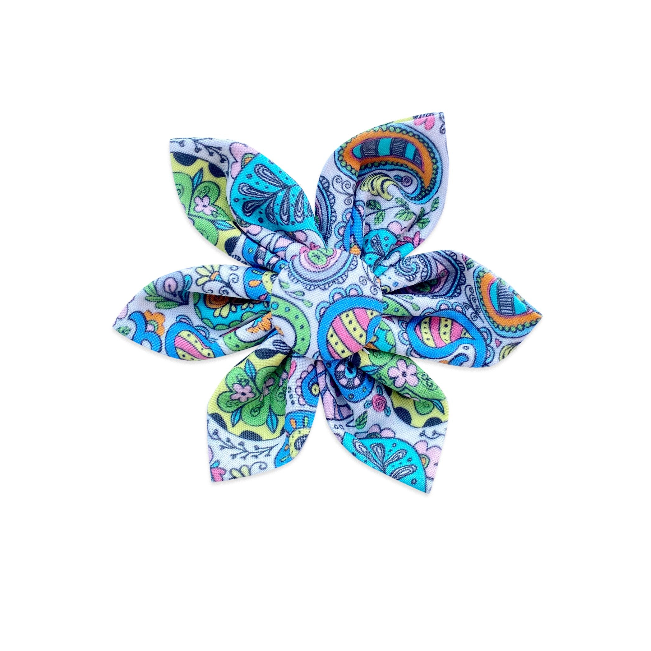 Dog Collar Flower. Dog Collar Accessory by Duke & Fox eith blue and orange paisley print to make a bold statemnent piece.