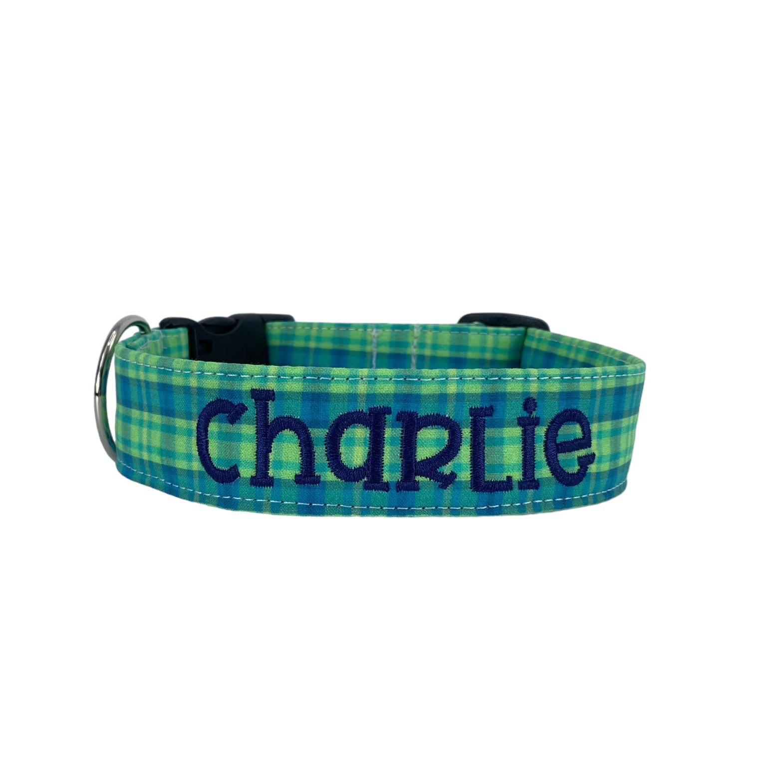 Whether choosing from a traditional dog collar, embroidered dog collar, or engraved buckle dog collar, you’ll find a great selection of personalized dog collars to choose from. Duke & Fox® personalized dog collars come in a variety of unique styles and patterns. Our embroidered collars and engraved buckle collars also add to your dog's safety and your peace of mind with critical contact information should you and your dog get separated. Blue and green dog collar.