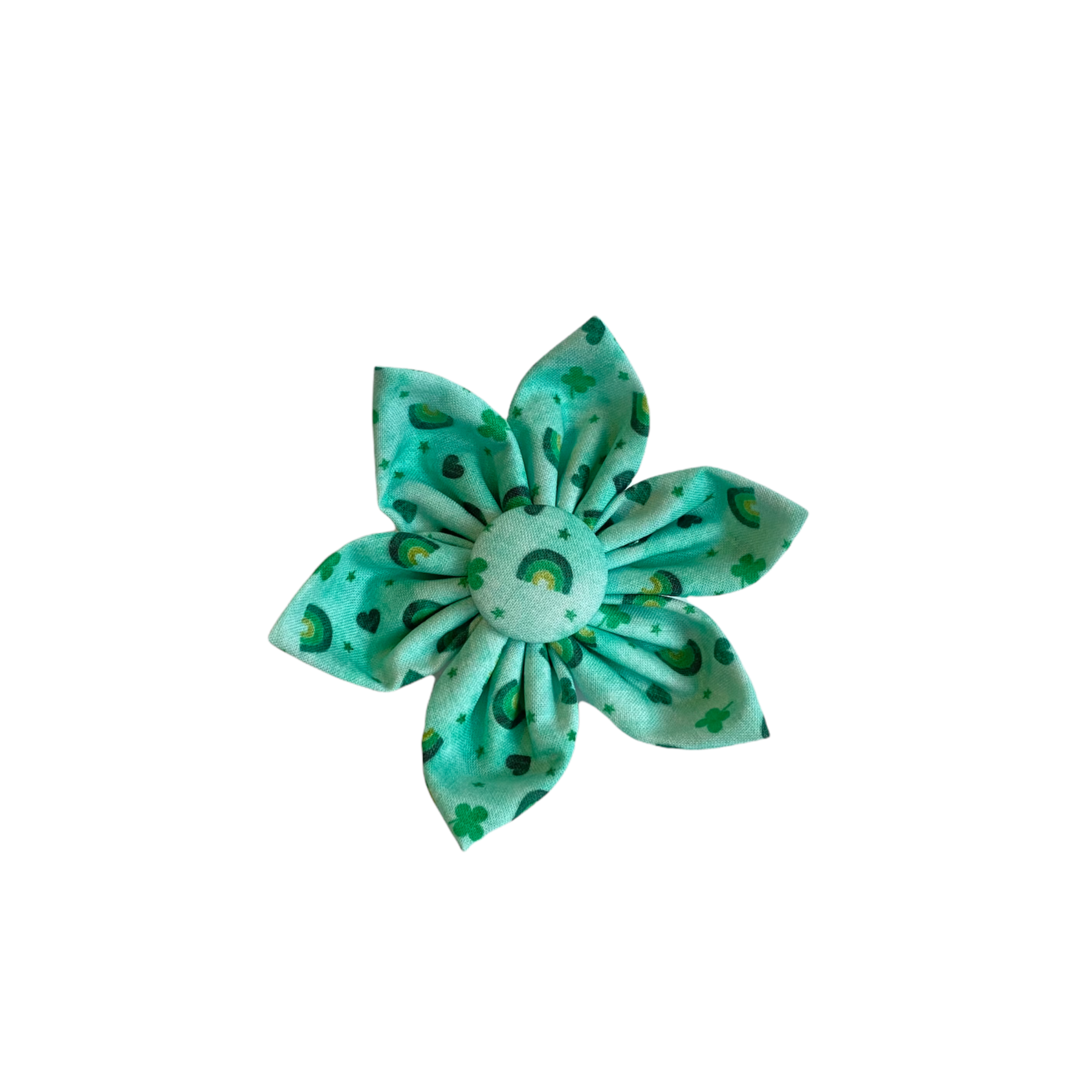 Green dog collar flower featuring small green rainbows and green shamrocks.