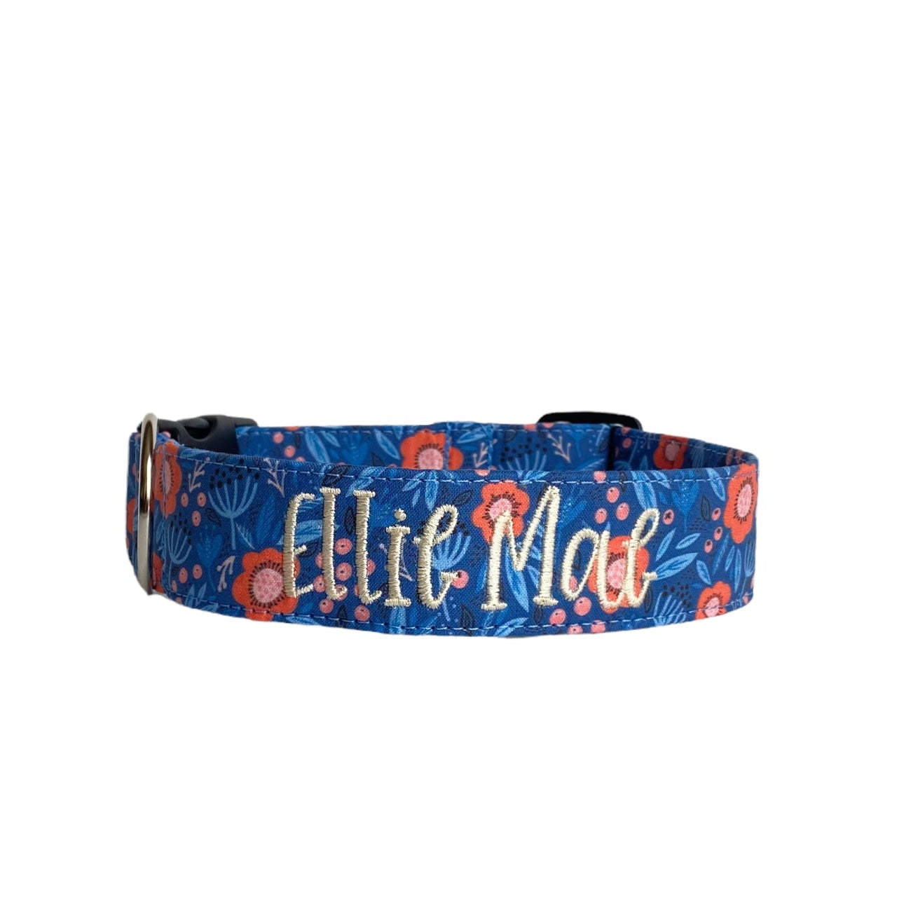Whether choosing from a traditional dog collar, embroidered dog collar, or engraved buckle dog collar, you’ll find a great selection of personalized dog collars to choose from.  Duke & Fox® personalized dog collars come in a variety of unique styles and patterns. Our embroidered collars and engraved buckle collars also add to your dog's safety and your peace of mind with critical contact information should you and your dog get separated.  Blue coral floral dog collar.