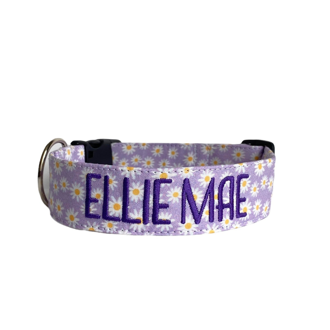 Whether choosing from a traditional dog collar, embroidered dog collar, or engraved buckle dog collar, you’ll find a great selection of personalized dog collars to choose from. Duke & Fox® personalized dog collars come in a variety of unique styles and patterns. Our embroidered collars and engraved buckle collars also add to your dog's safety and your peace of mind with critical contact information should you and your dog get separated. Lavender dog collar with white daisies.