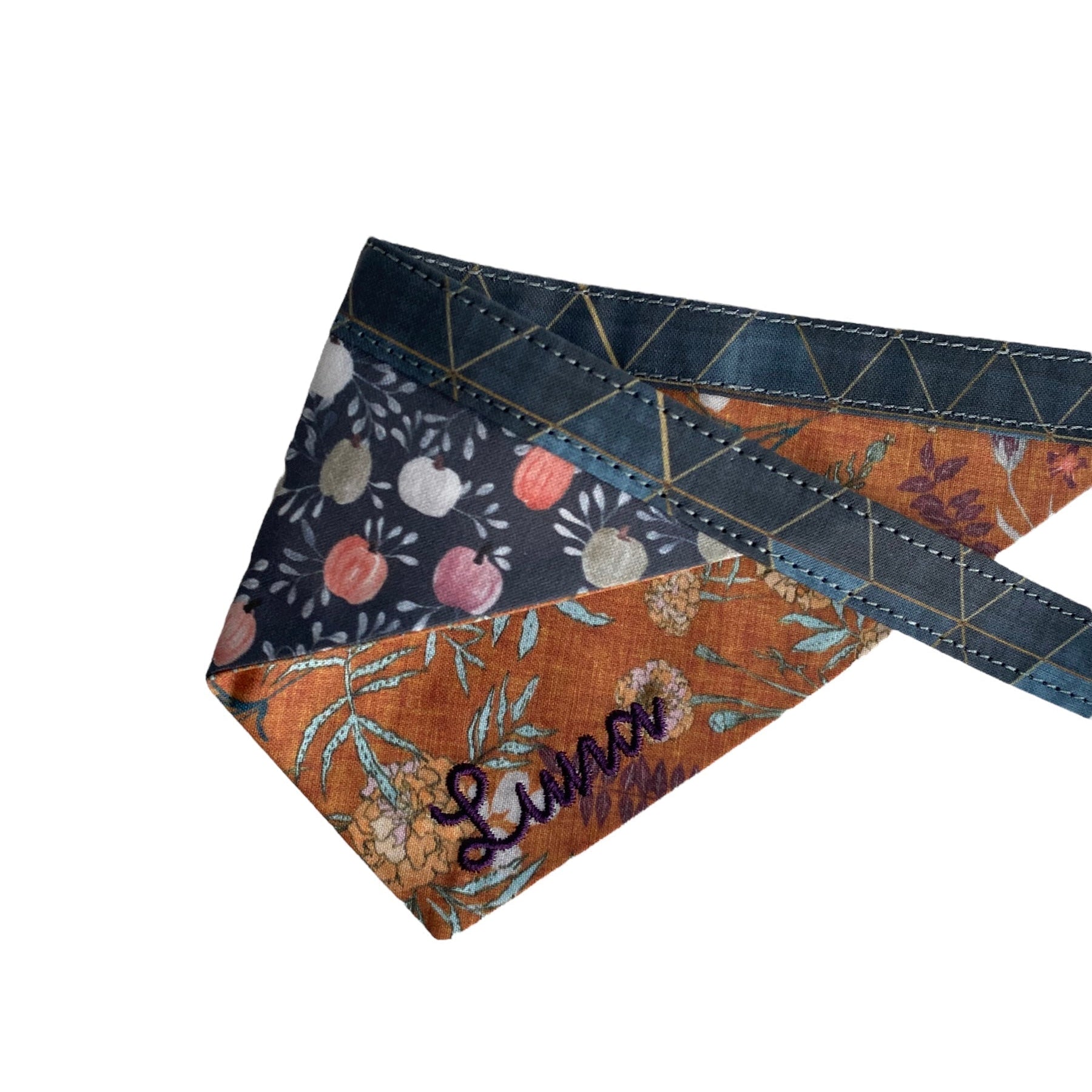 A personalized bandana by Duke & Fox is the perfect pet accessory that is customized with the pet's name. Bandanas that are double sided for more options. Rustic floral embroidered dog bandana. Farmhouse pumpkins dog bandana.