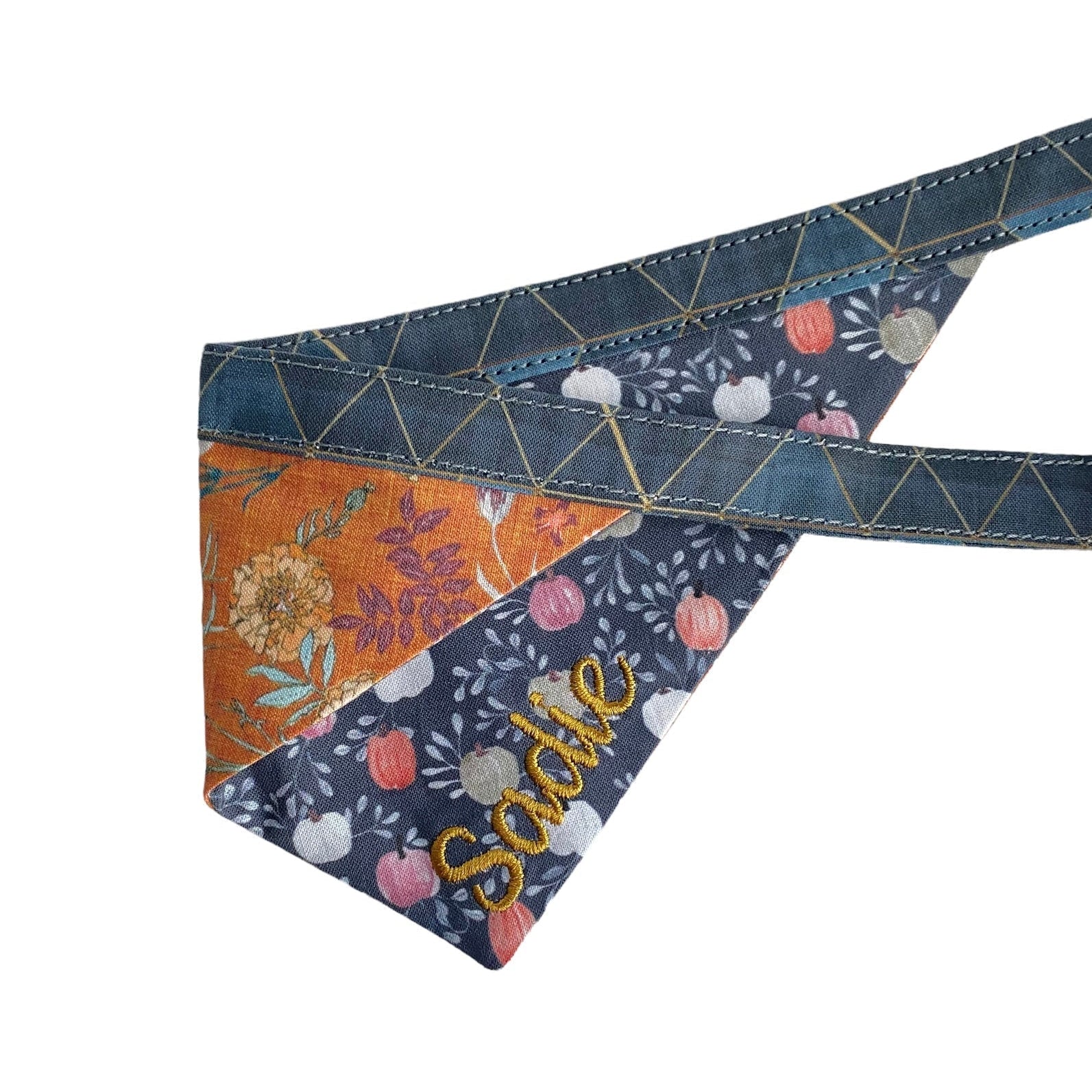 A personalized bandana by Duke & Fox is the perfect pet accessory that is customized with the pet's name. Bandanas that are double sided for more options. Farmhouse pumpkins dog bandana. Rustic floral embroidered dog bandana.