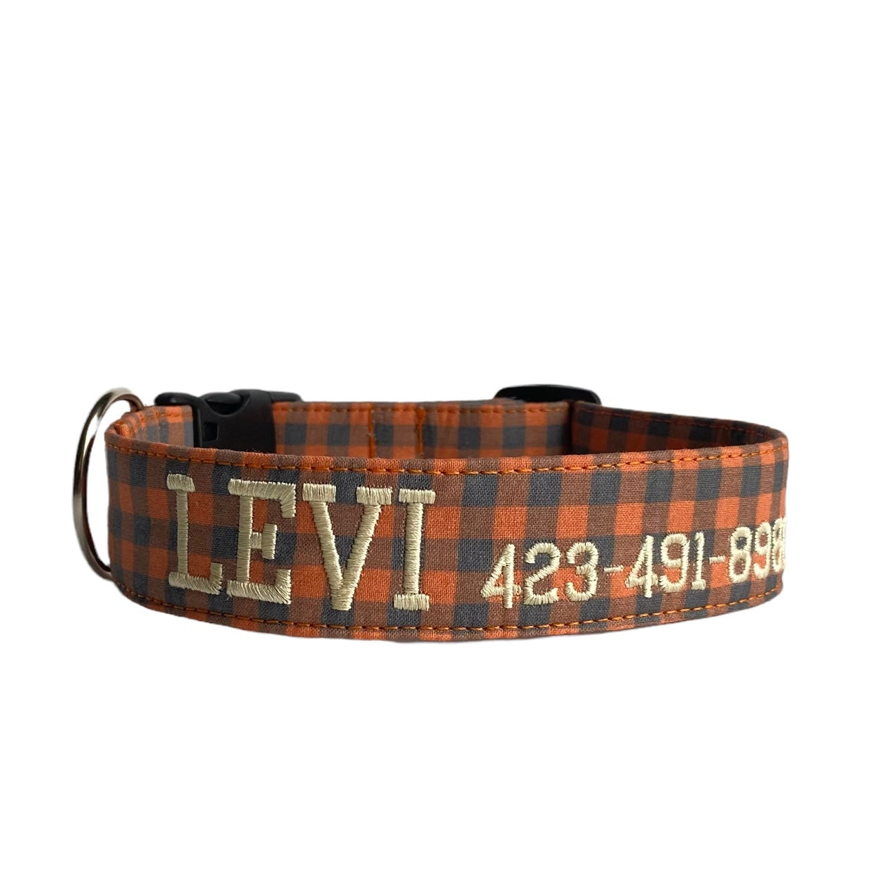 Whether choosing from a traditional dog collar, embroidered dog collar, or engraved buckle dog collar, you’ll find a great selection of personalized dog collars to choose from. Duke & Fox® personalized dog collars come in a variety of unique styles and patterns. Our embroidered collars and engraved buckle collars also add to your dog's safety and your peace of mind with critical contact information should you and your dog get separated. Orange and charcoal buffalo dog collar. Fall dog collar.