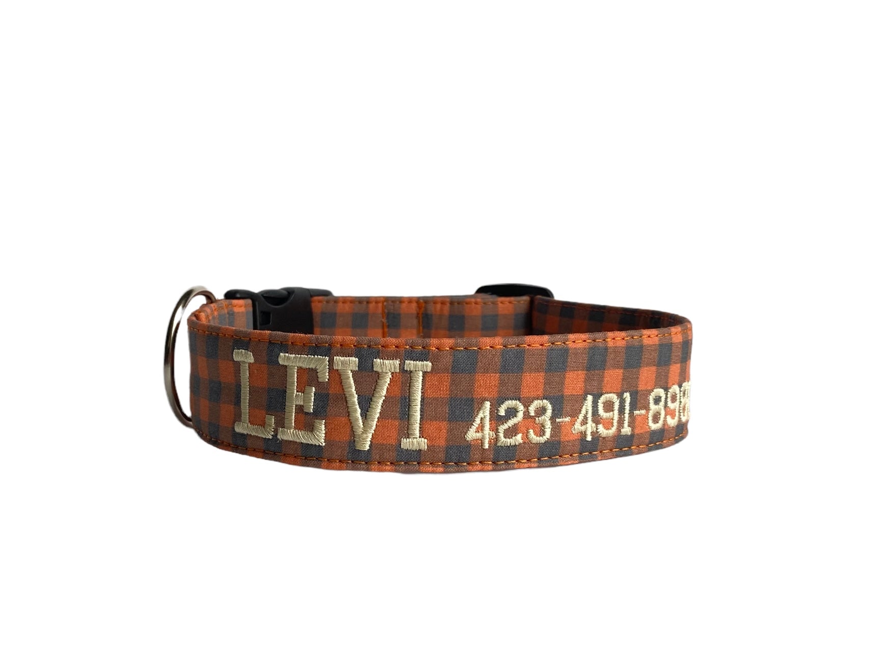 Whether choosing from a traditional dog collar, embroidered dog collar, or engraved buckle dog collar, you’ll find a great selection of personalized dog collars to choose from.  Duke & Fox® personalized dog collars come in a variety of unique styles and patterns. Our embroidered collars and engraved buckle collars also add to your dog's safety and your peace of mind with critical contact information should you and your dog get separated.  Orange and charcoal buffalo dog collar. Fall dog collar.