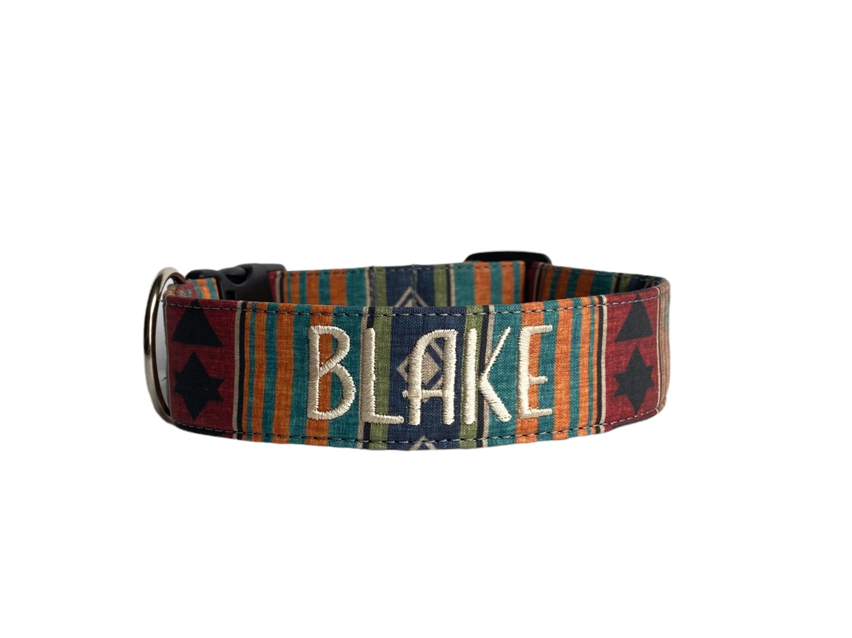 Whether choosing from a traditional dog collar, embroidered dog collar, or engraved buckle dog collar, you’ll find a great selection of personalized dog collars to choose from.  Duke & Fox® personalized dog collars come in a variety of unique styles and patterns. Our embroidered collars and engraved buckle collars also add to your dog's safety and your peace of mind with critical contact information should you and your dog get separated.  Fall southwest dog collar.
