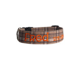 Whether choosing from a traditional dog collar, embroidered dog collar, or engraved buckle dog collar, you’ll find a great selection of personalized dog collars to choose from.  Duke & Fox® personalized dog collars come in a variety of unique styles and patterns. Our embroidered collars and engraved buckle collars also add to your dog's safety and your peace of mind with critical contact information should you and your dog get separated.  Brown plaid dog collar. 