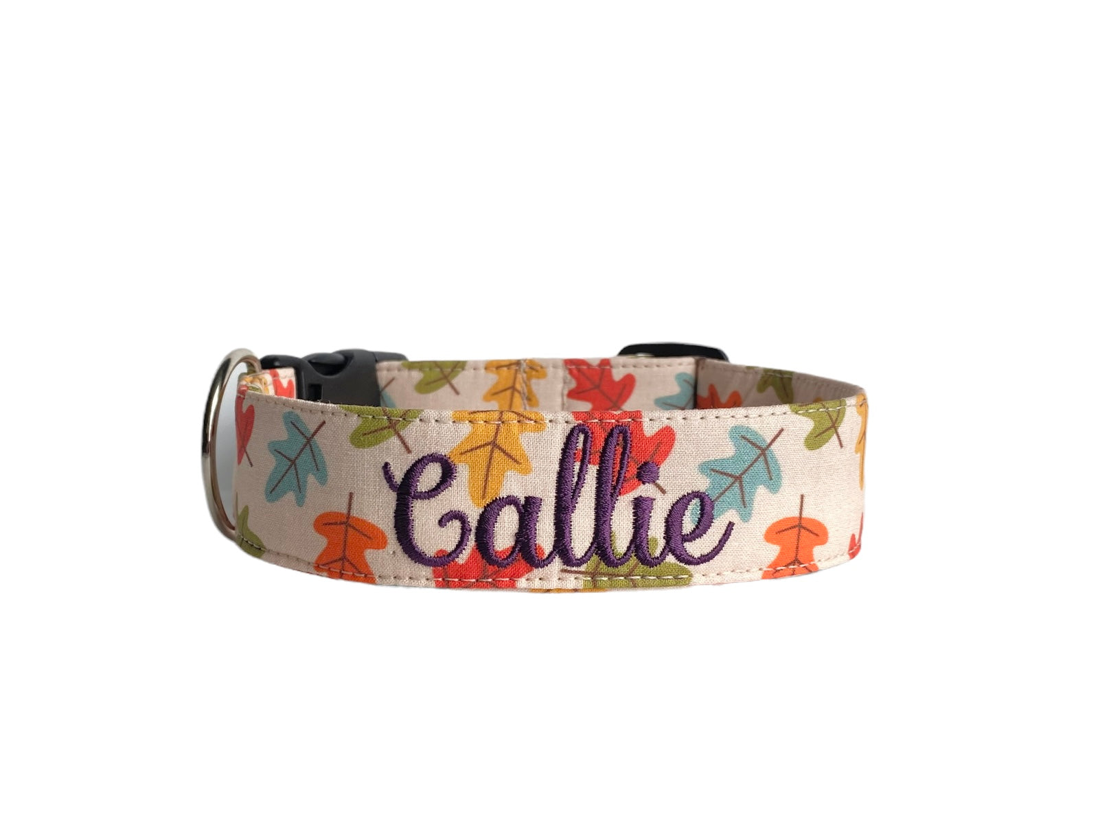 Whether choosing from a traditional dog collar, embroidered dog collar, or engraved buckle dog collar, you’ll find a great selection of personalized dog collars to choose from.  Duke & Fox® personalized dog collars come in a variety of unique styles and patterns. Our embroidered collars and engraved buckle collars also add to your dog's safety and your peace of mind with critical contact information should you and your dog get separated.  Fall leaves dog collar.