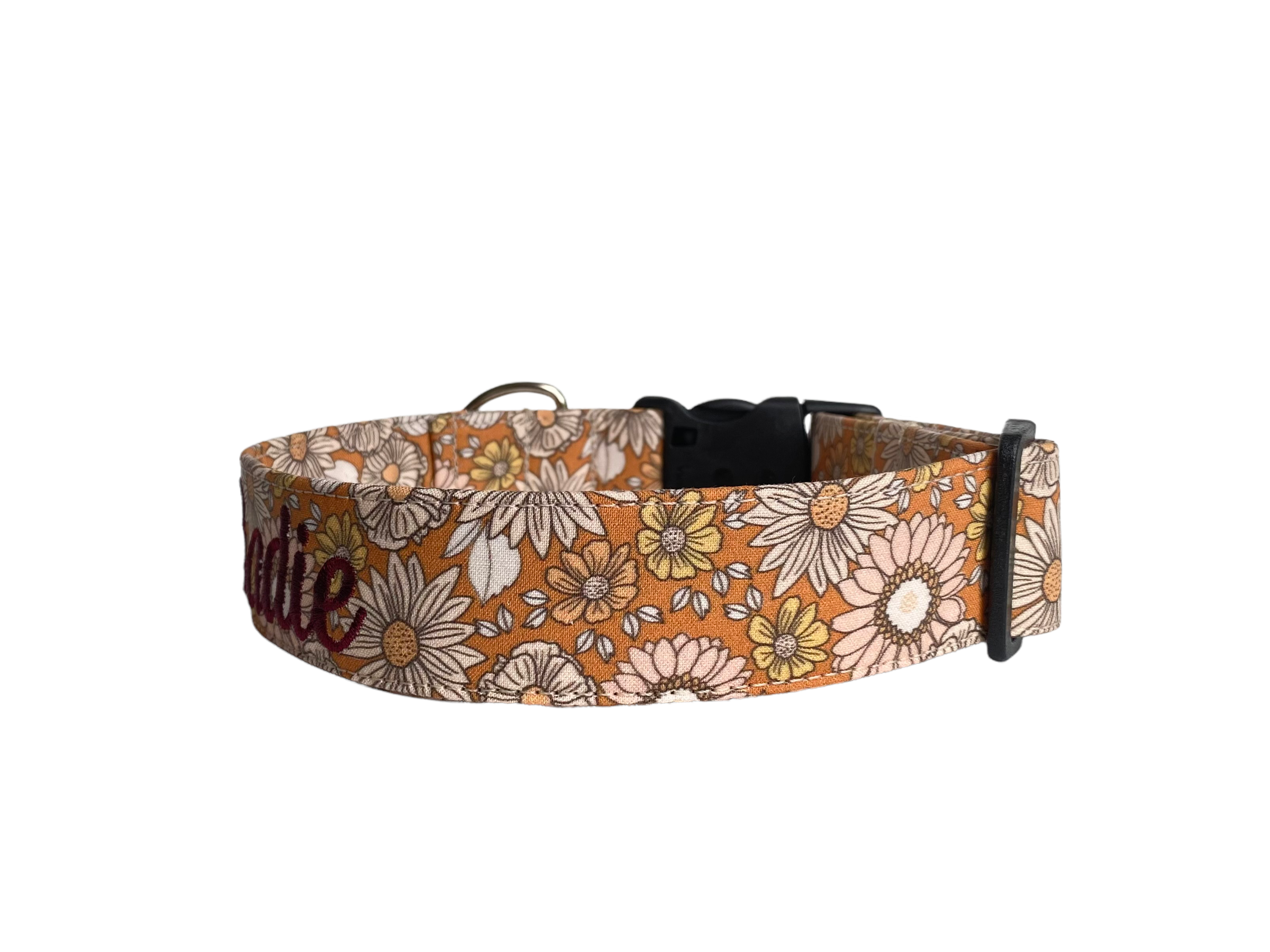 Whether choosing from a traditional dog collar, embroidered dog collar, or engraved buckle dog collar, you’ll find a great selection of personalized dog collars to choose from. Duke & Fox® personalized dog collars come in a variety of unique styles and patterns. Our embroidered collars and engraved buckle collars also add to your dog's safety and your peace of mind with critical contact information should you and your dog get separated. Daisy bloom dog collar. Fall dog collar.
