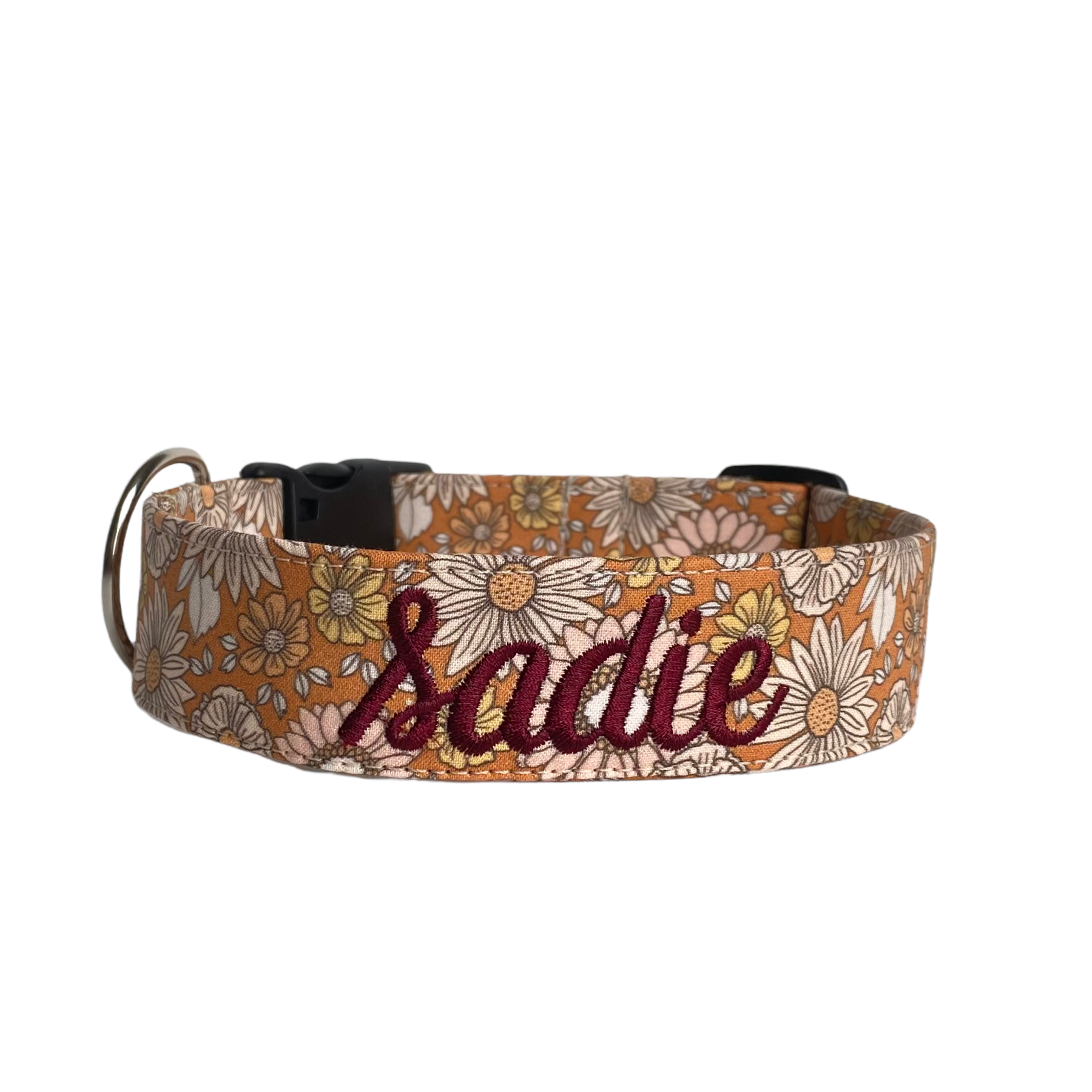 Whether choosing from a traditional dog collar, embroidered dog collar, or engraved buckle dog collar, you’ll find a great selection of personalized dog collars to choose from. Duke & Fox® personalized dog collars come in a variety of unique styles and patterns. Our embroidered collars and engraved buckle collars also add to your dog's safety and your peace of mind with critical contact information should you and your dog get separated. Daisy bloom dog collar. Fall dog collar.