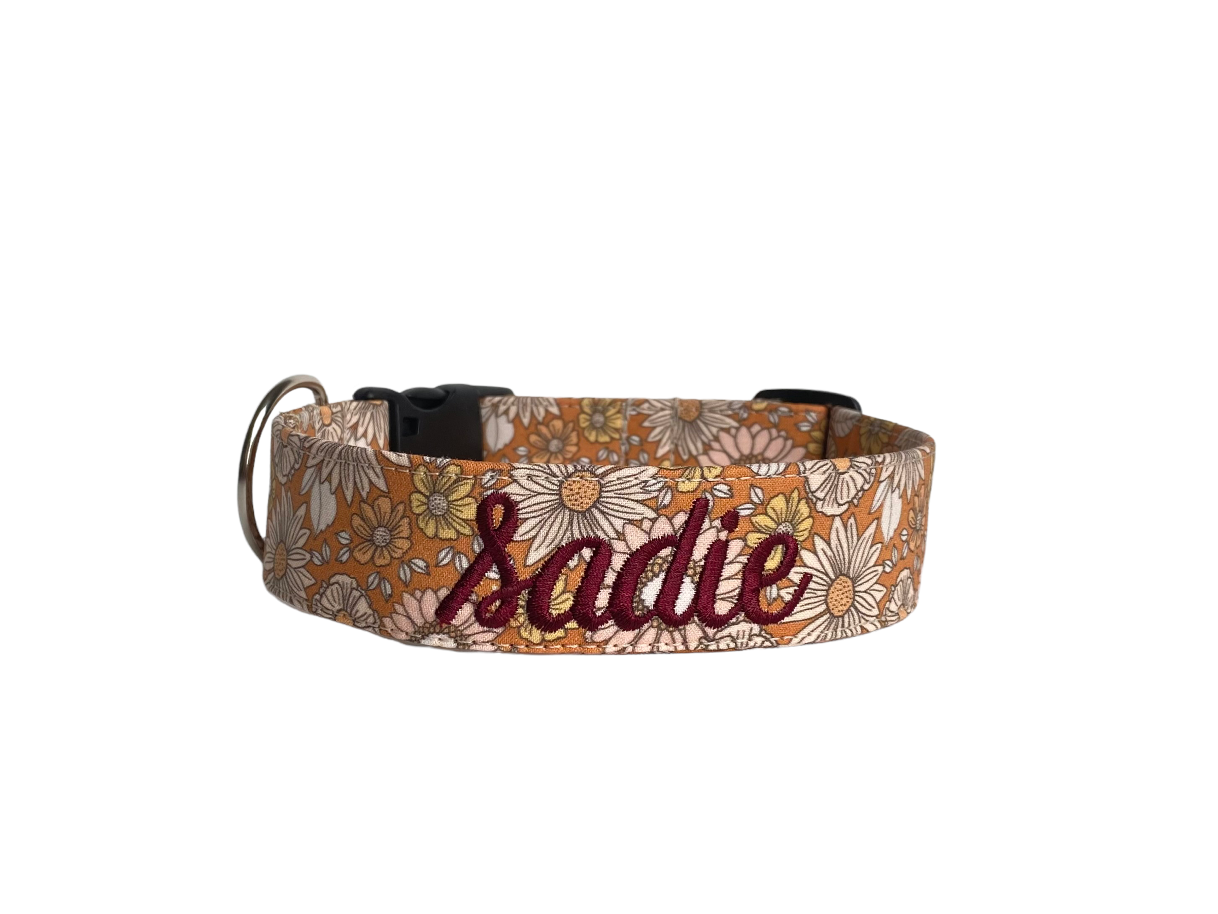Whether choosing from a traditional dog collar, embroidered dog collar, or engraved buckle dog collar, you’ll find a great selection of personalized dog collars to choose from. Duke & Fox® personalized dog collars come in a variety of unique styles and patterns. Our embroidered collars and engraved buckle collars also add to your dog's safety and your peace of mind with critical contact information should you and your dog get separated. Daisy bloom dog collar. Fall dog collar.