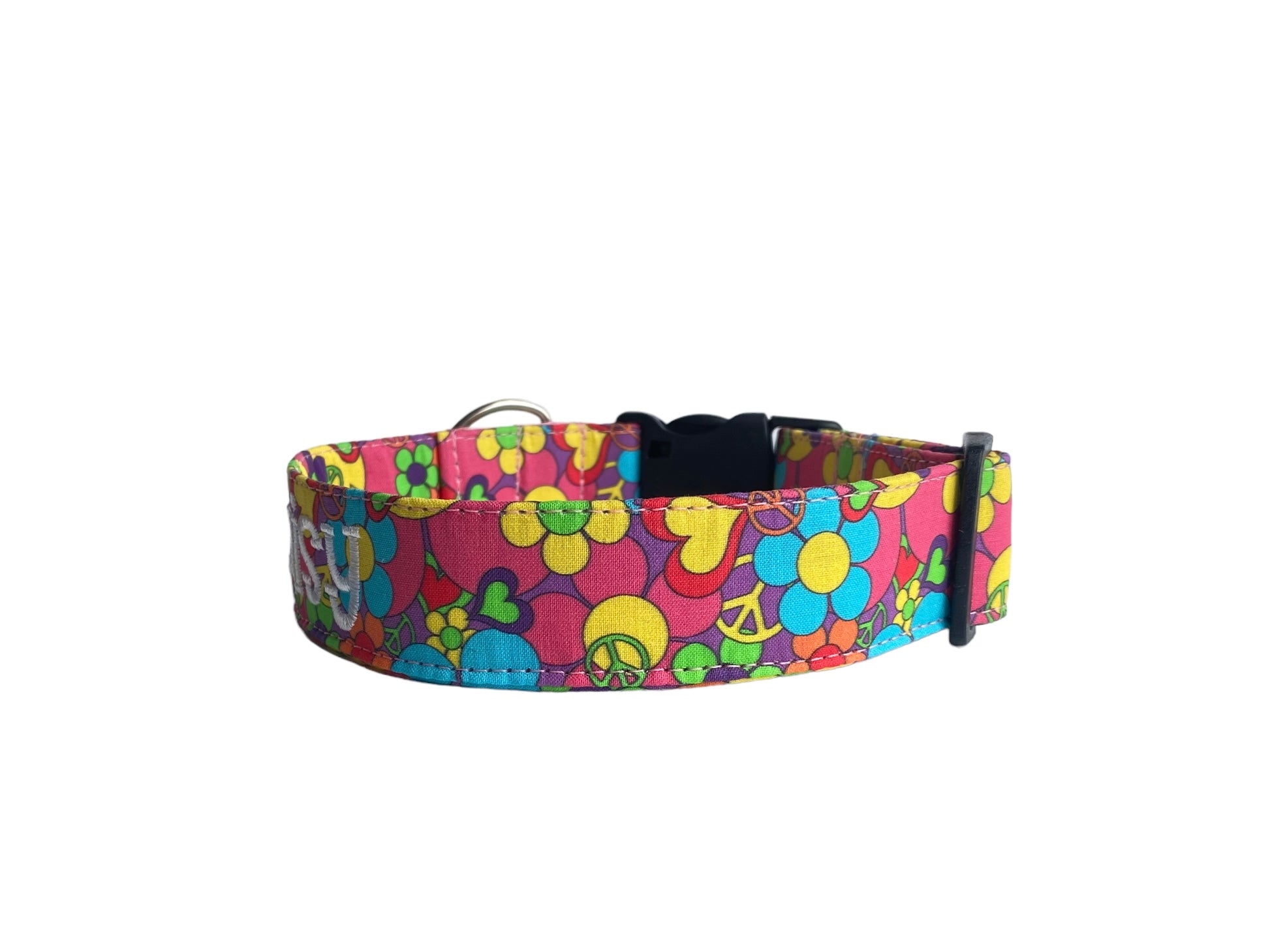Whether choosing from a traditional dog collar, embroidered dog collar, or engraved buckle dog collar, you’ll find a great selection of personalized dog collars to choose from.  Duke & Fox® personalized dog collars come in a variety of unique styles and patterns. Our embroidered collars and engraved buckle collars also add to your dog's safety and your peace of mind with critical contact information should you and your dog get separated.  70s peace and love dog collar.