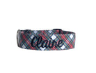 Whether choosing from a traditional dog collar, embroidered dog collar, or engraved buckle dog collar, you’ll find a great selection of personalized dog collars to choose from.  Duke & Fox® personalized dog collars come in a variety of unique styles and patterns. Our embroidered collars and engraved buckle collars also add to your dog's safety and your peace of mind with critical contact information should you and your dog get separated.  Christmas white and red tartan dog collar.