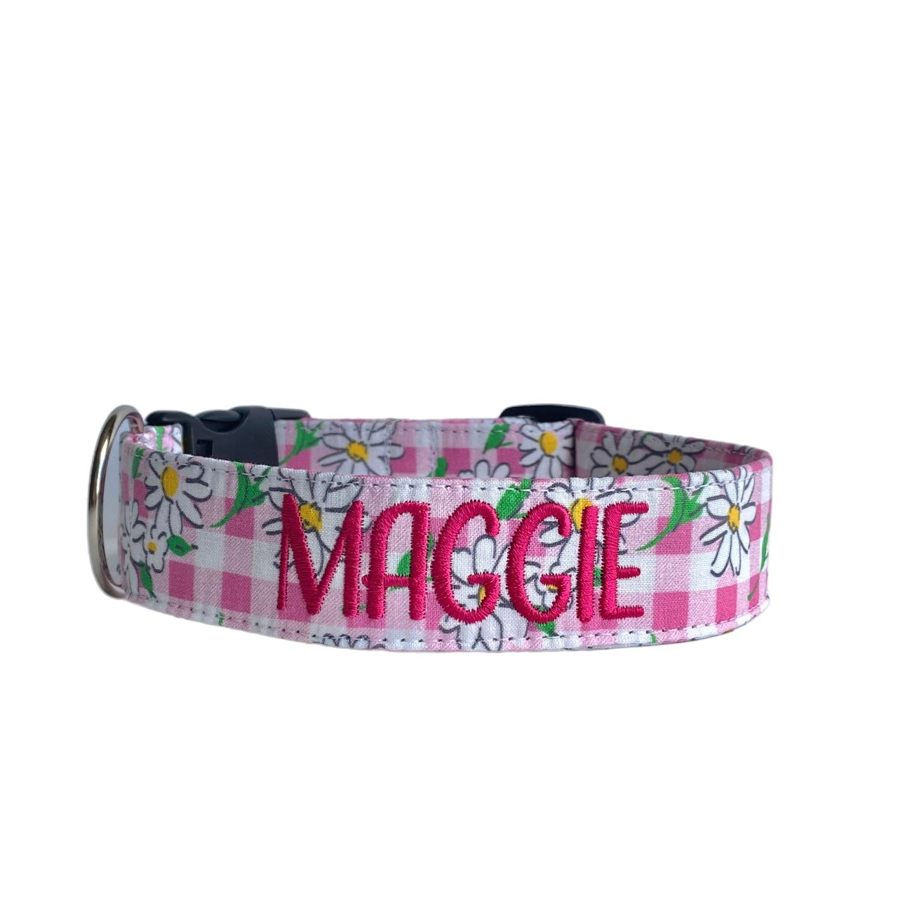 Whether choosing from a traditional dog collar, embroidered dog collar, or engraved buckle dog collar, you’ll find a great selection of personalized dog collars to choose from. Duke & Fox® personalized dog collars come in a variety of unique styles and patterns. Our embroidered collars and engraved buckle collars also add to your dog's safety and your peace of mind with critical contact information should you and your dog get separated. Pink ging daisy dog collar.