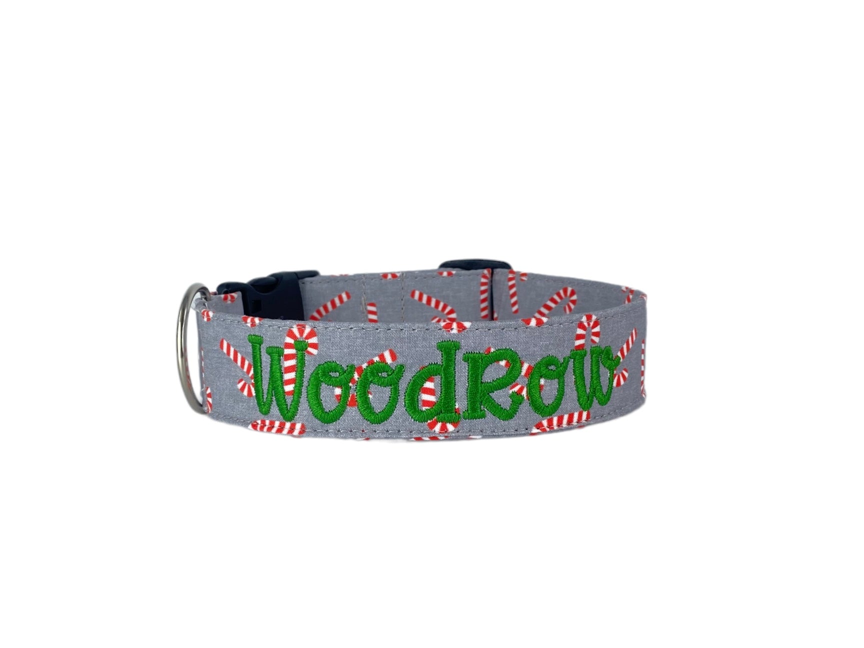 Whether choosing from a traditional dog collar, embroidered dog collar, or engraved buckle dog collar, you’ll find a great selection of personalized dog collars to choose from.  Duke & Fox® personalized dog collars come in a variety of unique styles and patterns. Our embroidered collars and engraved buckle collars also add to your dog's safety and your peace of mind with critical contact information should you and your dog get separated.  Christmas candy cane dog collar.