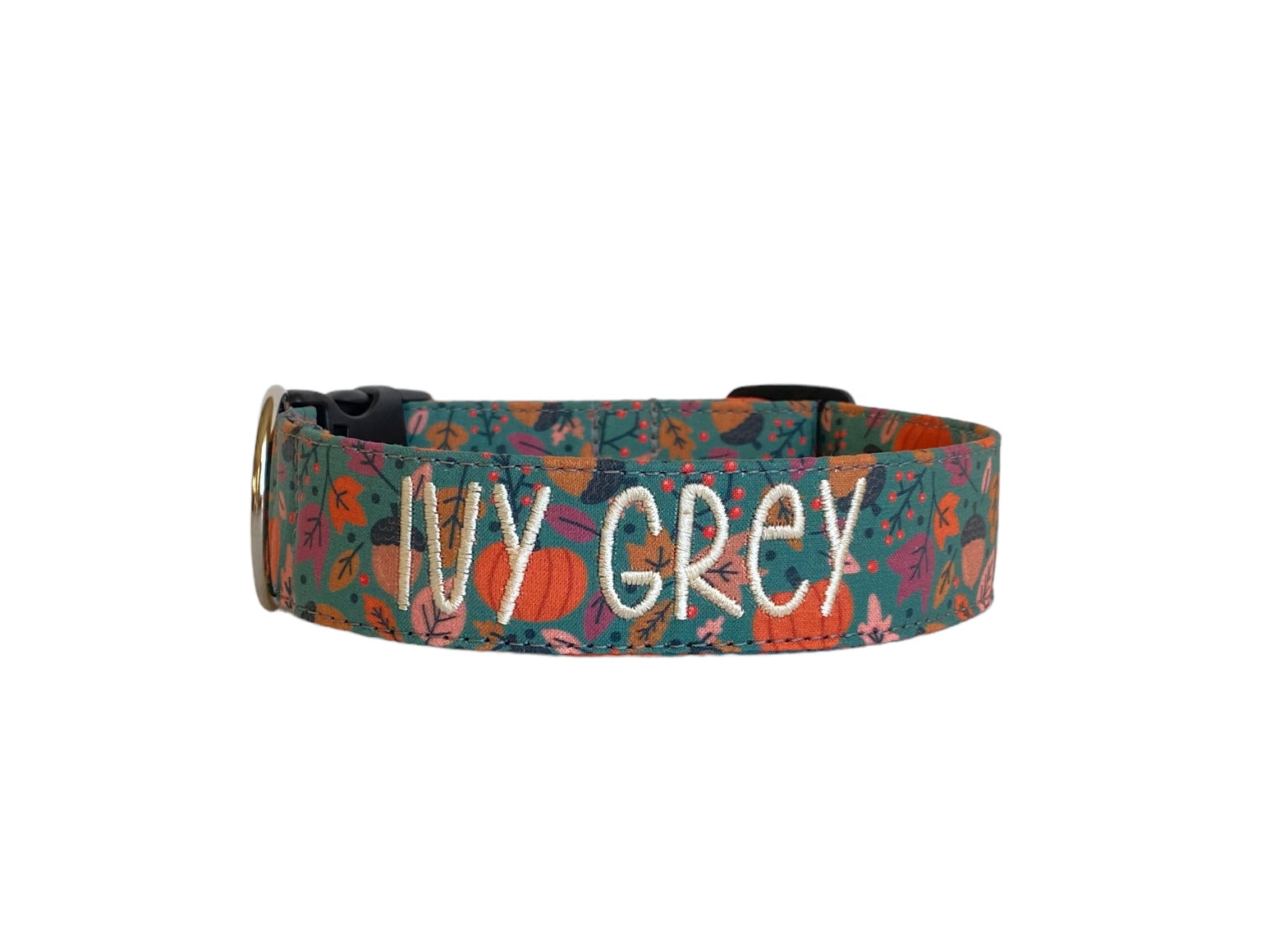 Whether choosing from a traditional dog collar, embroidered dog collar, or engraved buckle dog collar, you’ll find a great selection of personalized dog collars to choose from.  Duke & Fox® personalized dog collars come in a variety of unique styles and patterns. Our embroidered collars and engraved buckle collars also add to your dog's safety and your peace of mind with critical contact information should you and your dog get separated.  Fall green pumpkin dog collar.