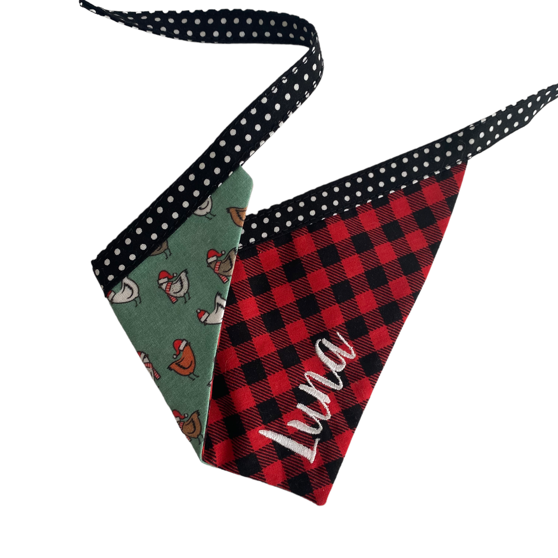 A personalized bandana by Duke & Fox is the perfect pet accessory that is customized with the pet's name. Bandanas that are double sided for more options. Buffalo plaid embroidered dog bandana. Christmas chicken embroiderd dog bandana.