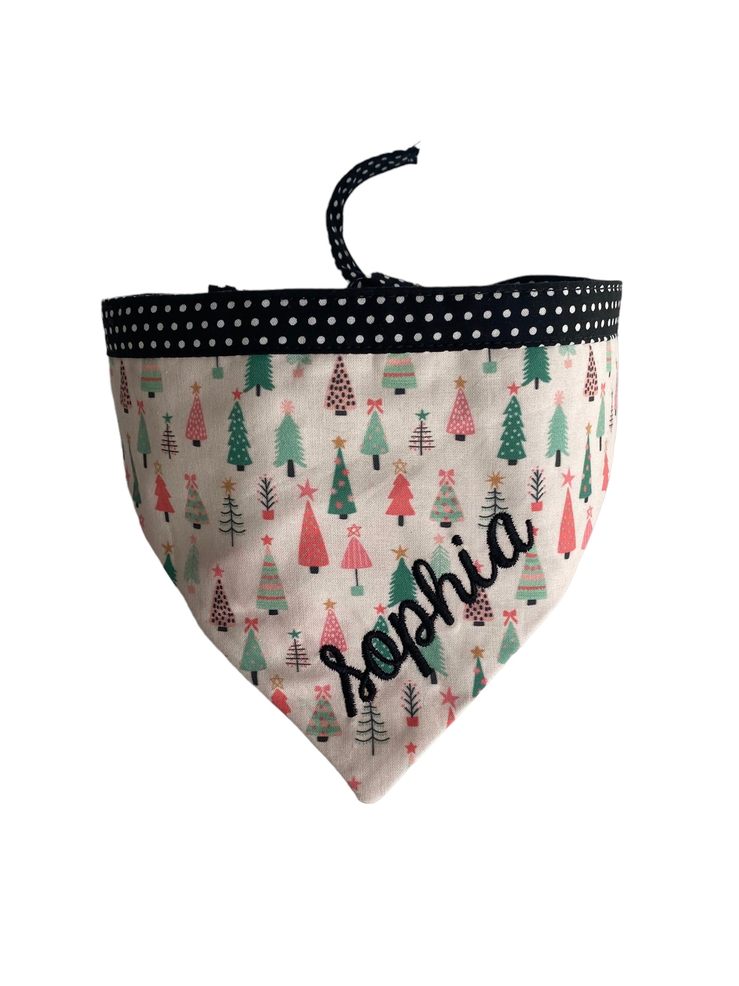 A personalized bandana by Duke & Fox is the perfect pet accessory that is customized with the pet's name. Bandanas that are double sided for more options. Buffalo plaid embroidered dog bandana. Christmas pink trees embroidered dog bandana.