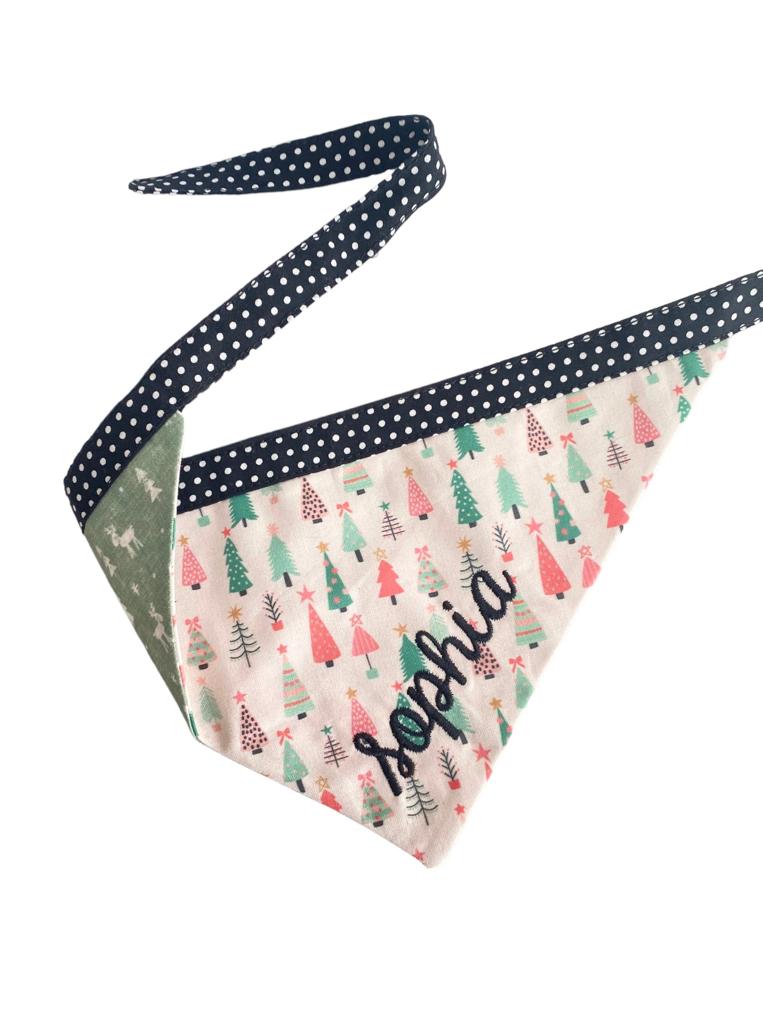 A personalized bandana by Duke & Fox is the perfect pet accessory that is customized with the pet's name. Bandanas that are double sided for more options. Christmas pink trees embroidered dog bandana. Reindeer embroidered dog bandana.