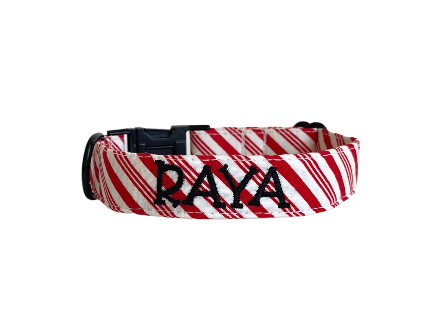 Whether choosing from a traditional dog collar, embroidered dog collar, or engraved buckle dog collar, you’ll find a great selection of personalized dog collars to choose from.  Duke & Fox® personalized dog collars come in a variety of unique styles and patterns. Our embroidered collars and engraved buckle collars also add to your dog's safety and your peace of mind with critical contact information should you and your dog get separated.  Christmas candy cane dog collar.