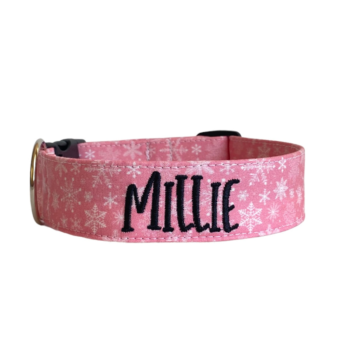 Whether choosing from a traditional dog collar, embroidered dog collar, or engraved buckle dog collar, you’ll find a great selection of personalized dog collars to choose from. Duke & Fox® personalized dog collars come in a variety of unique styles and patterns. Our embroidered collars and engraved buckle collars also add to your dog's safety and your peace of mind with critical contact information should you and your dog get separated. Christmas pink snowflake dog collar.