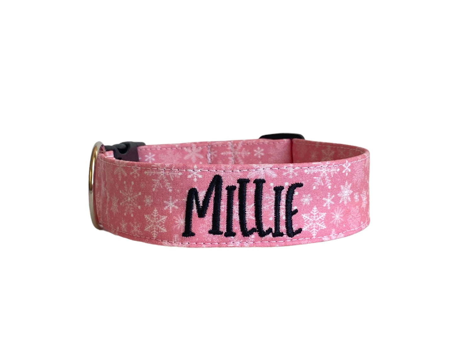 Whether choosing from a traditional dog collar, embroidered dog collar, or engraved buckle dog collar, you’ll find a great selection of personalized dog collars to choose from.  Duke & Fox® personalized dog collars come in a variety of unique styles and patterns. Our embroidered collars and engraved buckle collars also add to your dog's safety and your peace of mind with critical contact information should you and your dog get separated.  Christmas pink snowflake dog collar.