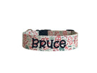 Whether choosing from a traditional dog collar, embroidered dog collar, or engraved buckle dog collar, you’ll find a great selection of personalized dog collars to choose from.  Duke & Fox® personalized dog collars come in a variety of unique styles and patterns. Our embroidered collars and engraved buckle collars also add to your dog's safety and your peace of mind with critical contact information should you and your dog get separated.  Christmas doodle dog collar.