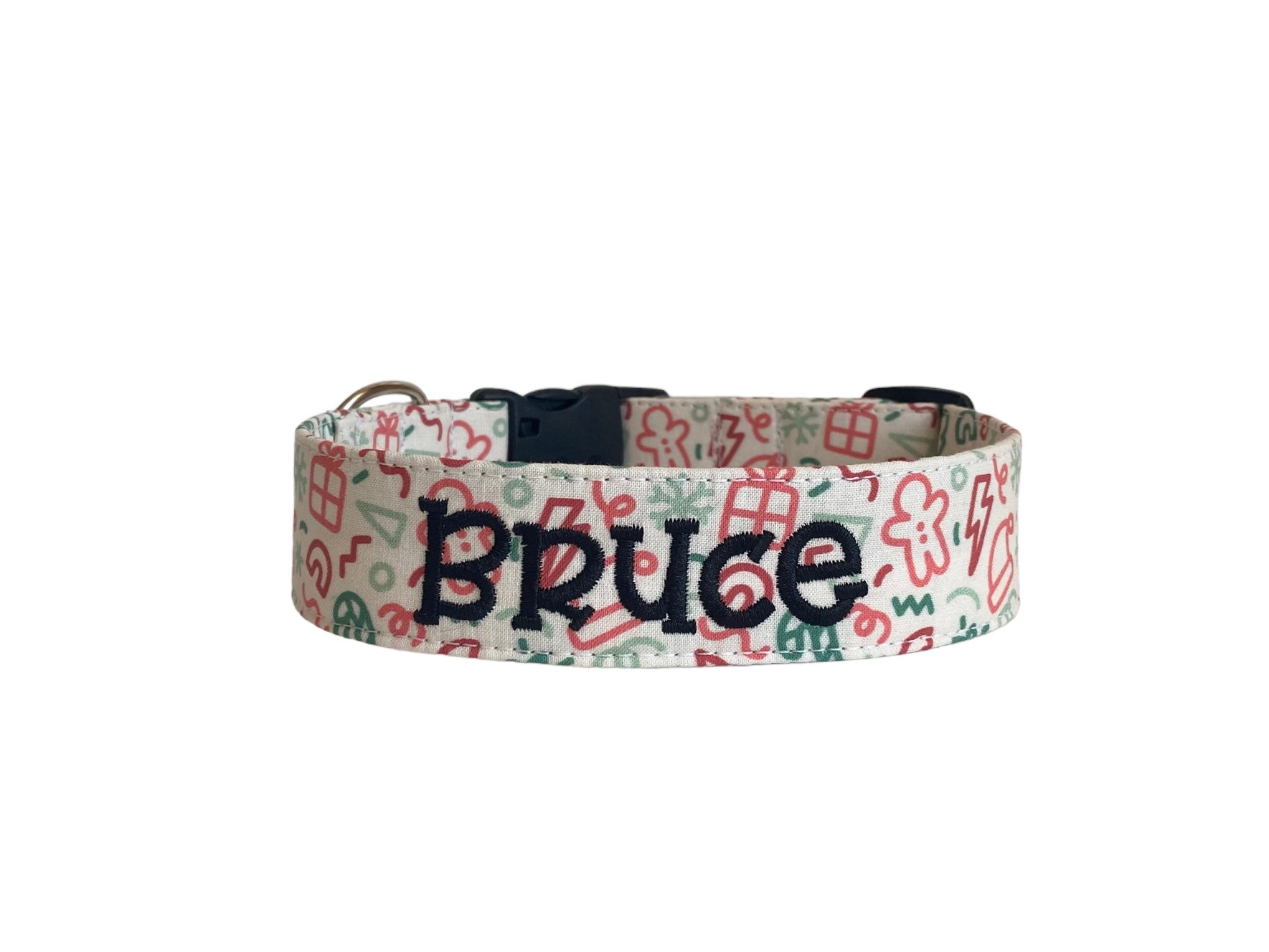Whether choosing from a traditional dog collar, embroidered dog collar, or engraved buckle dog collar, you’ll find a great selection of personalized dog collars to choose from.  Duke & Fox® personalized dog collars come in a variety of unique styles and patterns. Our embroidered collars and engraved buckle collars also add to your dog's safety and your peace of mind with critical contact information should you and your dog get separated.  Christmas doodle dog collar.