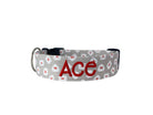 Duke & Fox Personalized Valetines Dog Collar with an embroidered name on a beige pattern with mini love letters.