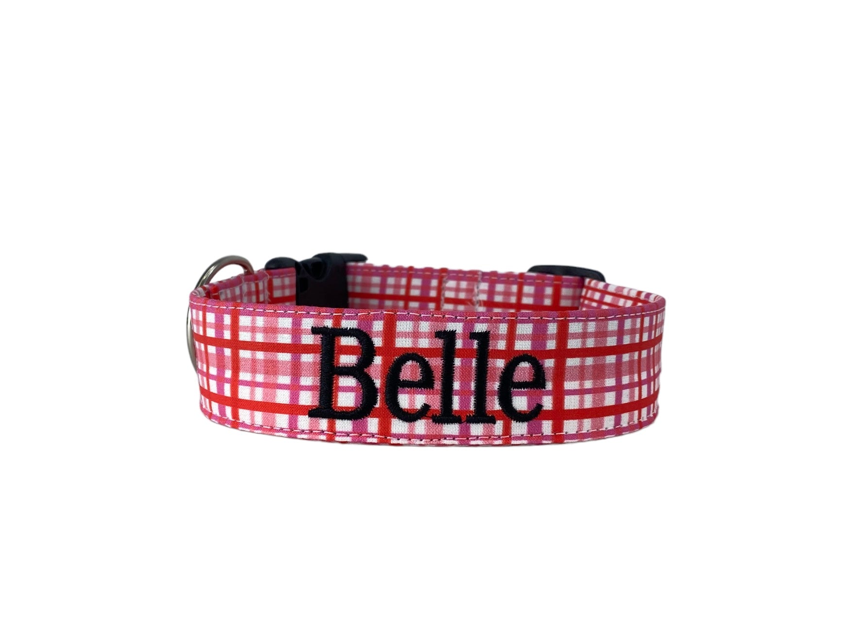 Whether choosing from a traditional dog collar, embroidered dog collar, or engraved buckle dog collar, you’ll find a great selection of personalized dog collars to choose from.  Duke & Fox® personalized dog collars come in a variety of unique styles and patterns. Our embroidered collars and engraved buckle collars also add to your dog's safety and your peace of mind with critical contact information should you and your dog get separated.  Valentine's Day pink plaid dog collar.