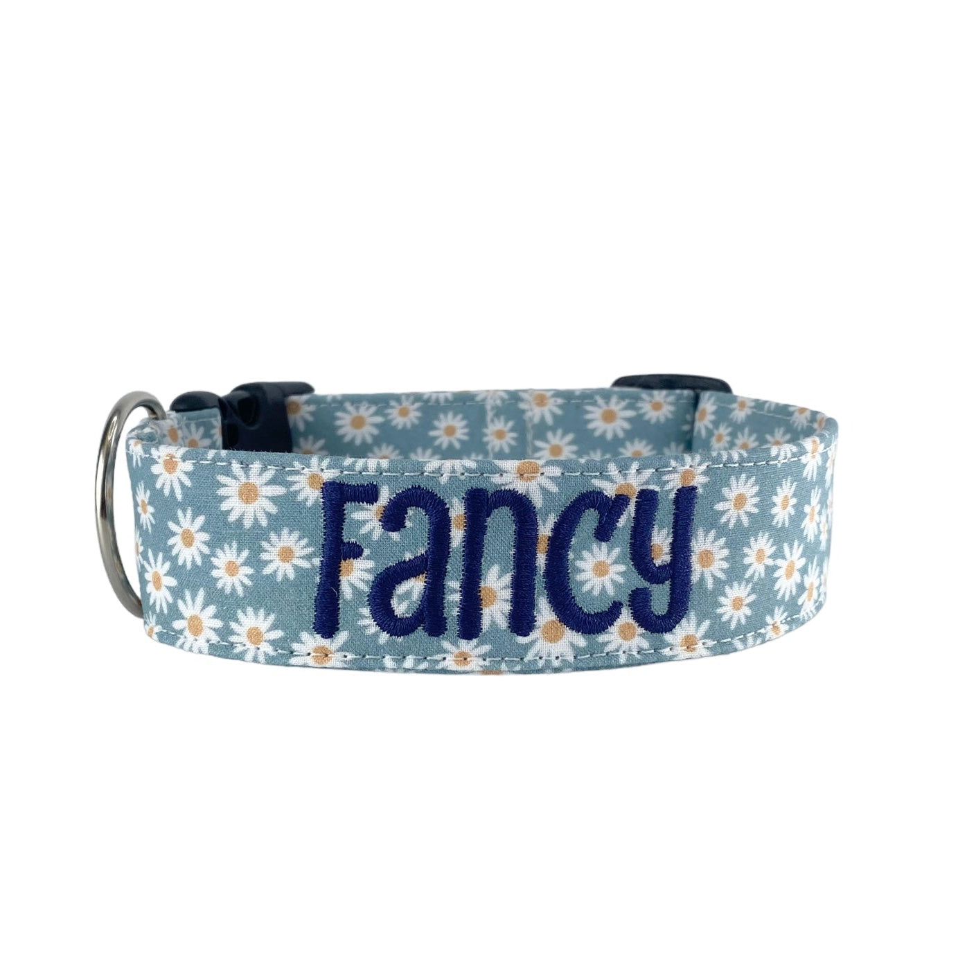 Whether choosing from a traditional dog collar, embroidered dog collar, or engraved buckle dog collar, you’ll find a great selection of personalized dog collars to choose from. Duke & Fox® personalized dog collars come in a variety of unique styles and patterns. Our embroidered collars and engraved buckle collars also add to your dog's safety and your peace of mind with critical contact information should you and your dog get separated. Blue daisy dog collar.