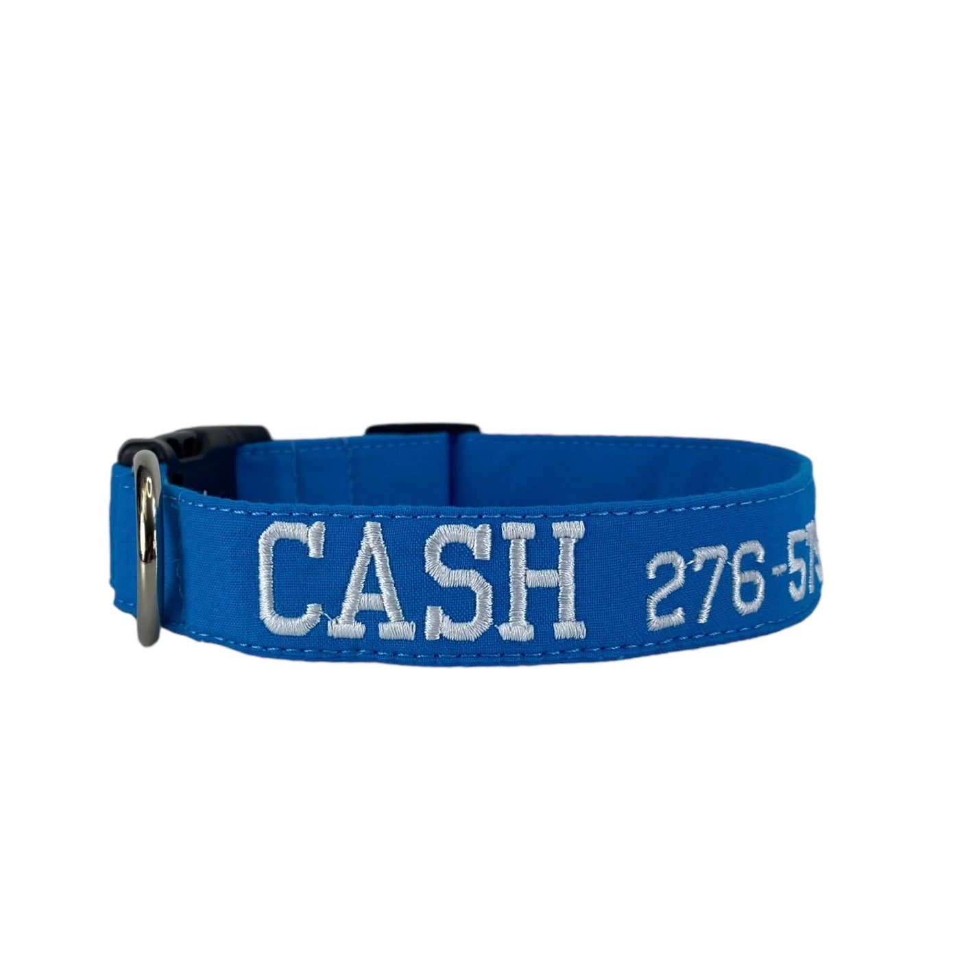 Whether choosing from a traditional dog collar, embroidered dog collar, or engraved buckle dog collar, you’ll find a great selection of personalized dog collars to choose from.  Duke & Fox® personalized dog collars come in a variety of unique styles and patterns. Our embroidered collars and engraved buckle collars also add to your dog's safety and your peace of mind with critical contact information should you and your dog get separated.  Solid aqua embroidered dog collar.