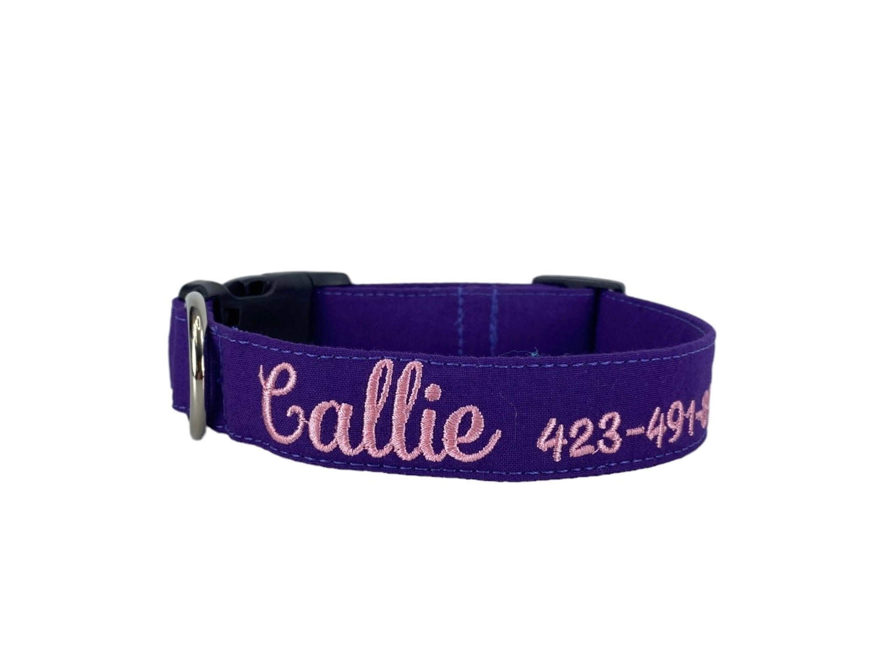 Whether choosing from a traditional dog collar, embroidered dog collar, or engraved buckle dog collar, you’ll find a great selection of personalized dog collars to choose from.  Duke & Fox® personalized dog collars come in a variety of unique styles and patterns. Our embroidered collars and engraved buckle collars also add to your dog's safety and your peace of mind with critical contact information should you and your dog get separated.  Solid purple embroidered dog collar.