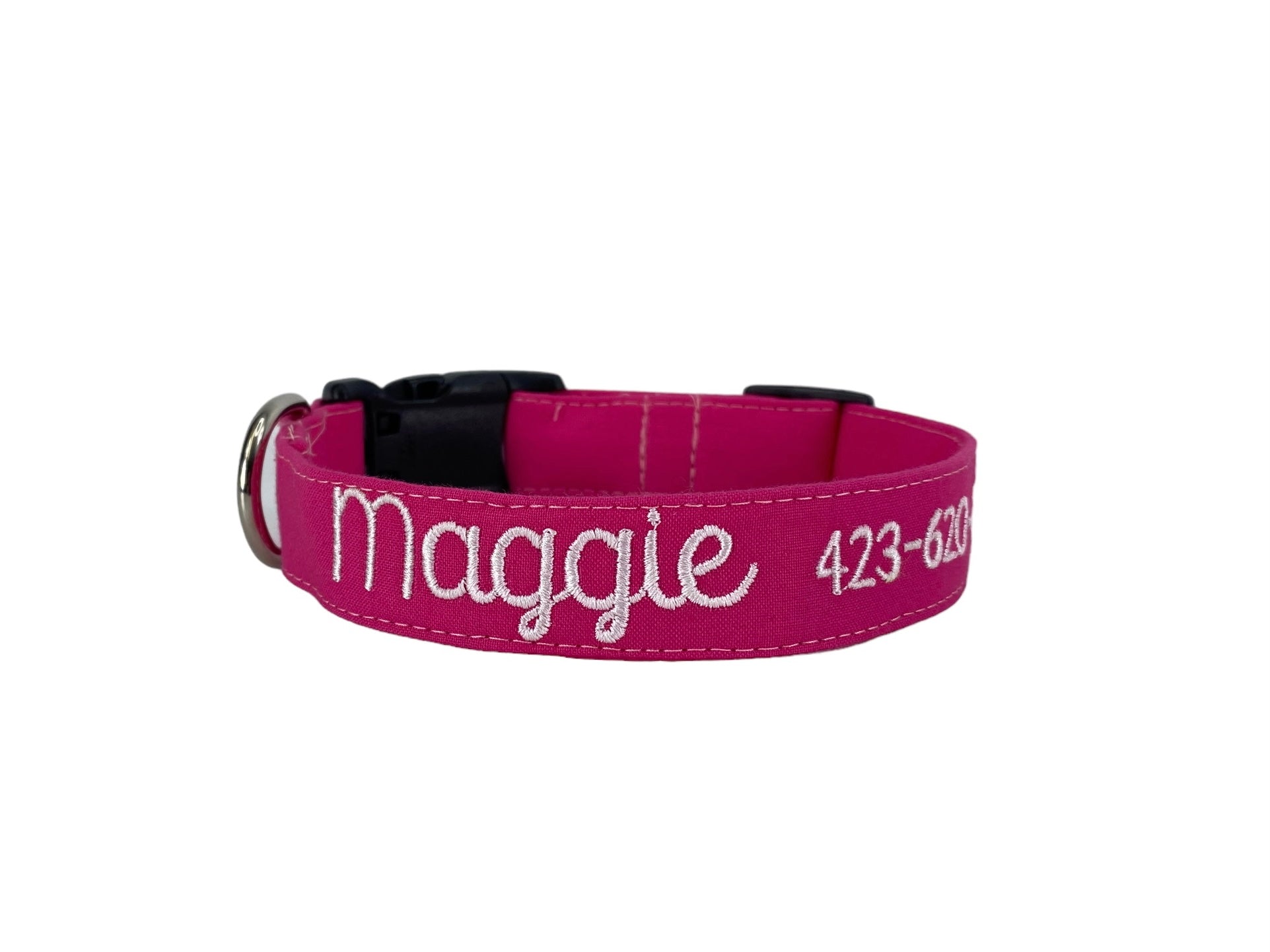 Whether choosing from a traditional dog collar, embroidered dog collar, or engraved buckle dog collar, you’ll find a great selection of personalized dog collars to choose from.  Duke & Fox® personalized dog collars come in a variety of unique styles and patterns. Our embroidered collars and engraved buckle collars also add to your dog's safety and your peace of mind with critical contact information should you and your dog get separated.  Solid hot pink embroidered dog collar.