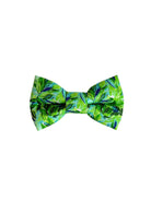 Green leaf-patterned bow tie on a white background.  Adjustable with velcro.  Custom dog bow tie by Duke & Fox.