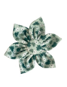 Green dog collar flower with small shamrocks and little white daisies