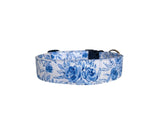 This elegant toile-patterned dog collar features a timeless blue and white floral design, perfect for adding a touch of sophistication to your pet's look. It can be personalized with embroidery, such as your dog's name, or with an engraved buckle for a stylish and functional accessory. Durable yet lightweight, this collar combines charm and practicality for everyday wear or special occasions.