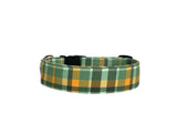 This is a festive and stylish St. Patrick's Day-inspired dog collar featuring a classic plaid pattern in shades of green, yellow, and gold, perfect for celebrating Irish traditions. It comes in a variety of sizes to fit dogs of all breeds and sizes, from small to large.

The collar is designed for customization, with the option to embroider your pet's name or a personalized message onto the fabric. Additionally, the buckle can be engraved with essential details, such as your pet's name or your contact infor