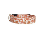 This elegant Kalamkari-inspired dog collar features a delicate floral design in earthy tones of rust and cream, evoking a timeless and artistic charm. The intricate pattern is perfect for adding a touch of sophistication to your pet’s wardrobe. Durable yet stylish, this collar is ideal for both everyday wear and special occasions. For a personalized touch, it can be customized with embroidery and an engraved buckle, making it as functional as it is beautiful.