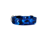 This blue camo personalized dog collar is a stylish and functional accessory for your dog. The collar features a pattern of blue camouflage, blending shades of navy, royal blue, and aqua with darker accents, giving it a trendy and modern look. The camo design is bold but not too overpowering, offering a nice balance between style and subtlety.