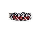 This personalized dog collar features a chic black-and-white checkered pattern with heart accents, making it a stylish choice for your pup. Embroidered with your pet’s name in bold red stitching, it’s both functional and fashionable. Complete with sturdy hardware, this collar is ideal for everyday use or special occasions. Perfect for dog owners seeking unique and customizable accessories for their furry friends!