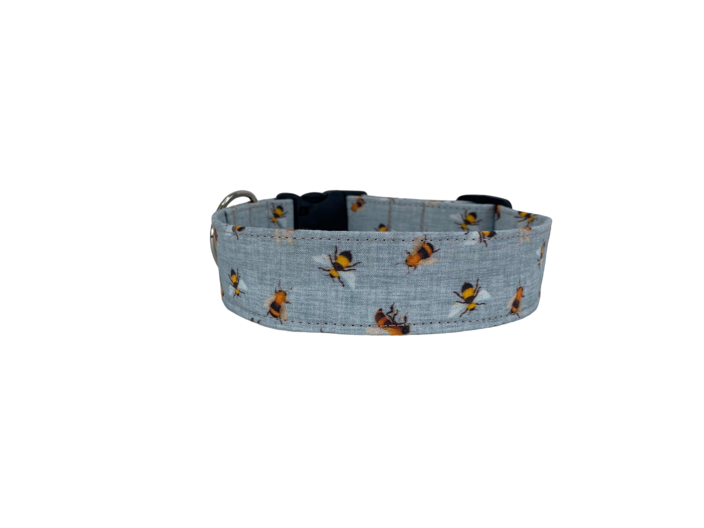 Whether choosing from a traditional dog collar, embroidered dog collar, or engraved buckle dog collar, you’ll find a great selection of personalized dog collars to choose from.  Duke & Fox® personalized dog collars come in a variety of unique styles and patterns. Our embroidered collars and engraved buckle collars also add to your dog's safety and your peace of mind with critical contact information should you and your dog get separated.  Honeybee dog collar. 