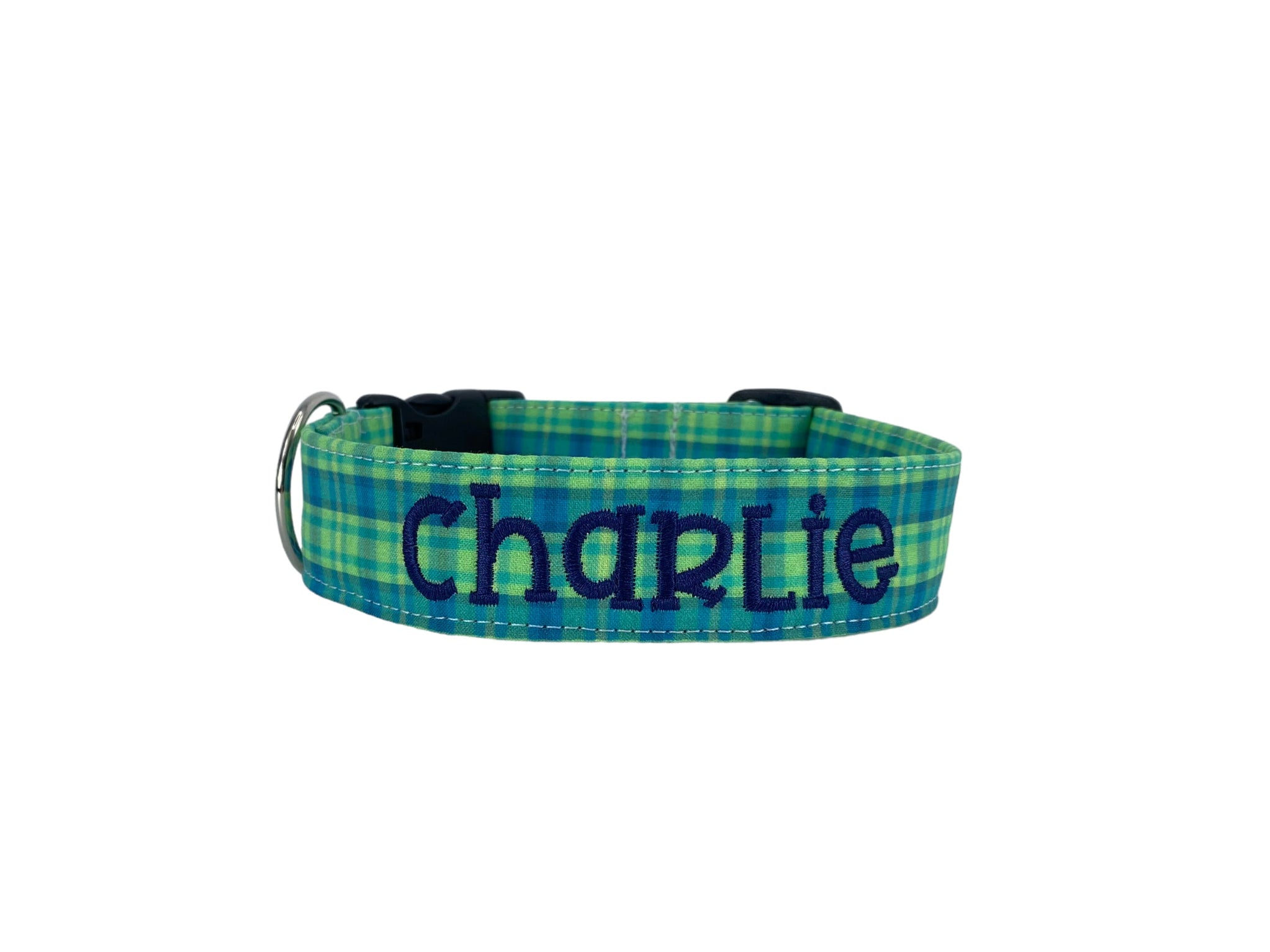 Whether choosing from a traditional dog collar, embroidered dog collar, or engraved buckle dog collar, you’ll find a great selection of personalized dog collars to choose from.  Duke & Fox® personalized dog collars come in a variety of unique styles and patterns. Our embroidered collars and engraved buckle collars also add to your dog's safety and your peace of mind with critical contact information should you and your dog get separated.  Blue and green dog collar. 