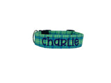 Whether choosing from a traditional dog collar, embroidered dog collar, or engraved buckle dog collar, you’ll find a great selection of personalized dog collars to choose from.  Duke & Fox® personalized dog collars come in a variety of unique styles and patterns. Our embroidered collars and engraved buckle collars also add to your dog's safety and your peace of mind with critical contact information should you and your dog get separated.  Blue and green dog collar. 