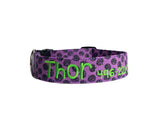 Whether choosing from a traditional dog collar, embroidered dog collar, or engraved buckle dog collar, you’ll find a great selection of personalized dog collars to choose from.  Duke & Fox® personalized dog collars come in a variety of unique styles and patterns. Our embroidered collars and engraved buckle collars also add to your dog's safety and your peace of mind with critical contact information should you and your dog get separated.  Purple jack o'lanterns dog collar. 
